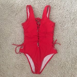 Red lace up one piece size large