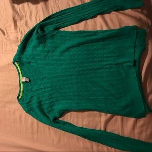 a green sweater