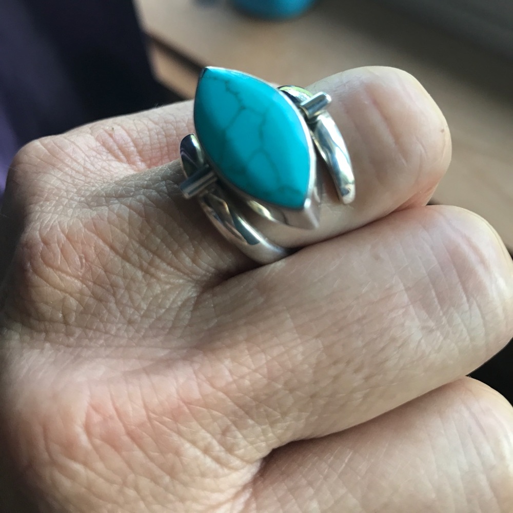 Two sided silver ring