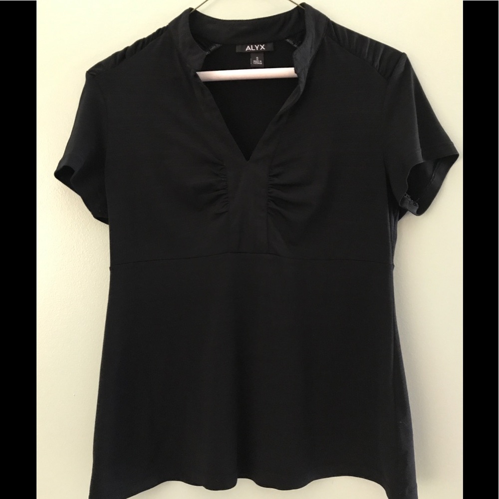 Black empire-waisted top.