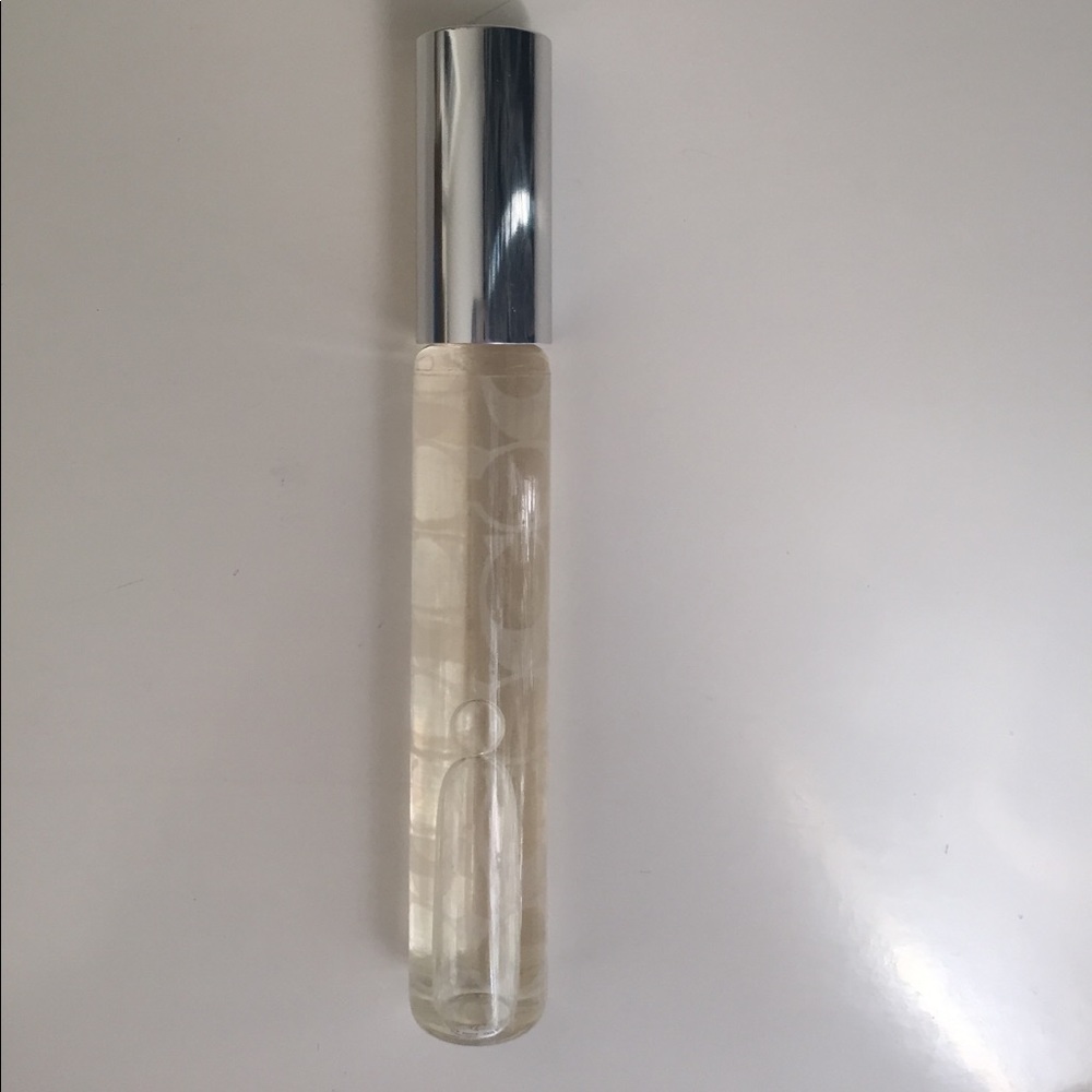 Like new: Coach Signature eau de parfum, roll on