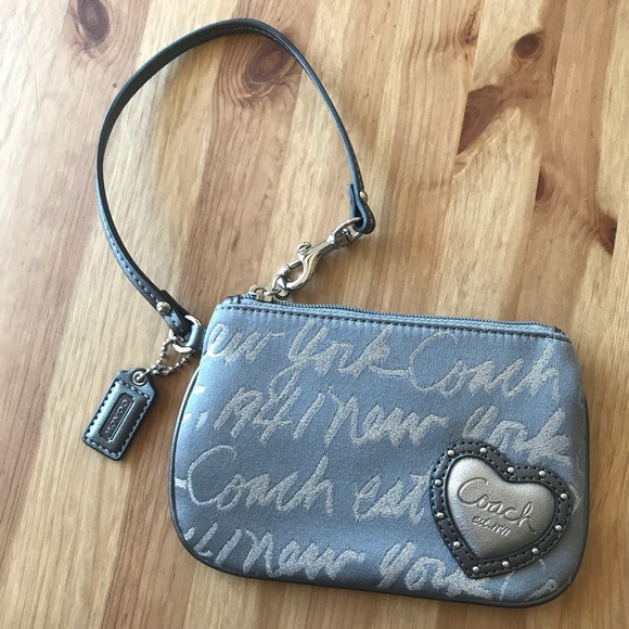 59 off Coach Handbags SilveryBlue Coach Wristlet — New York Heart