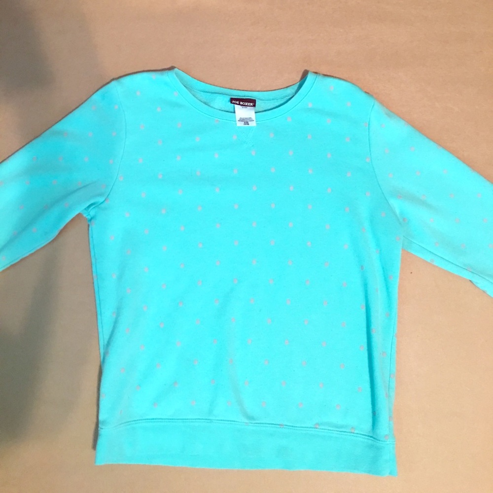 Bright blue sweater with golden polka dots