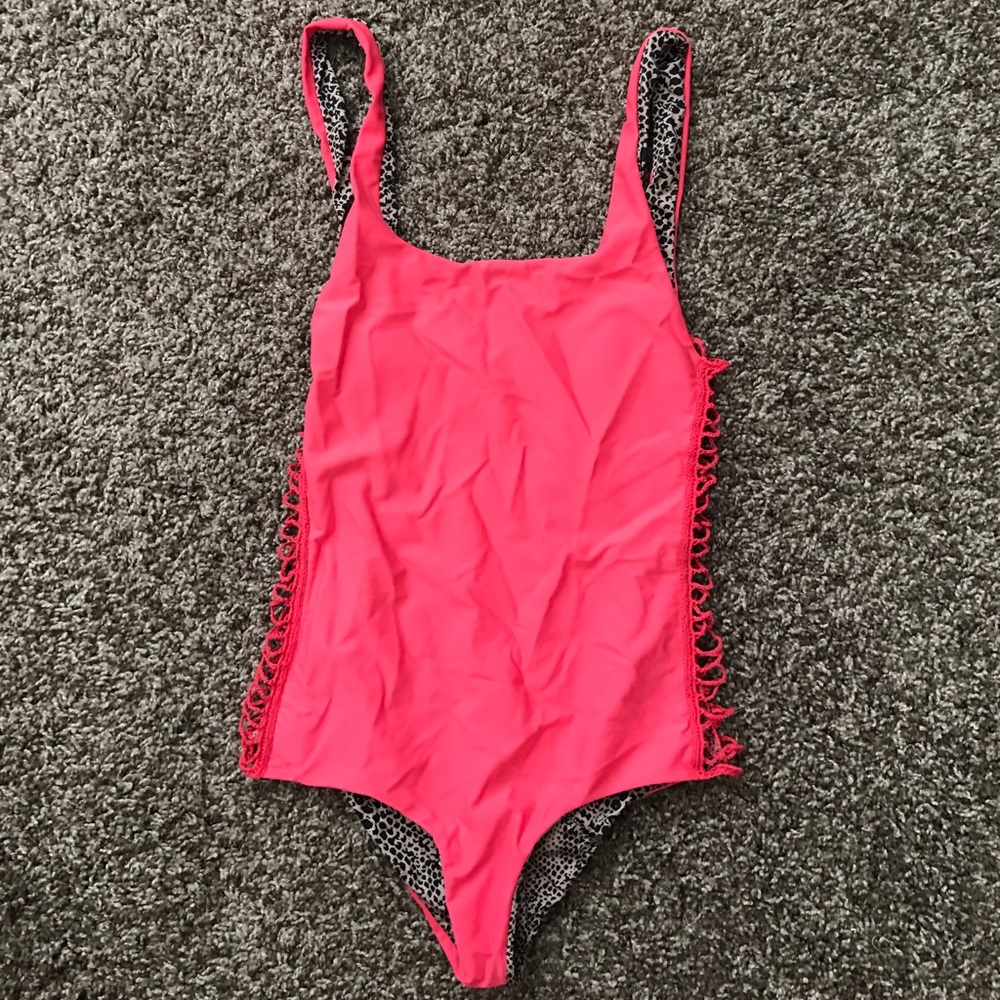 Acacia one piece size small.