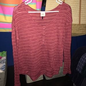 Maroon shirt.