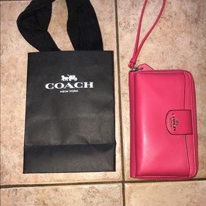 Brand New pink Coach wristlet wallet. Never used.