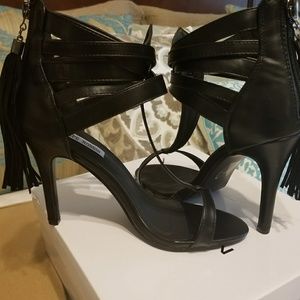 Black tassle zip up heels