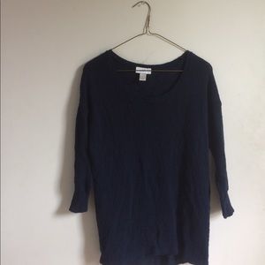 Dark blue knit sweater.
