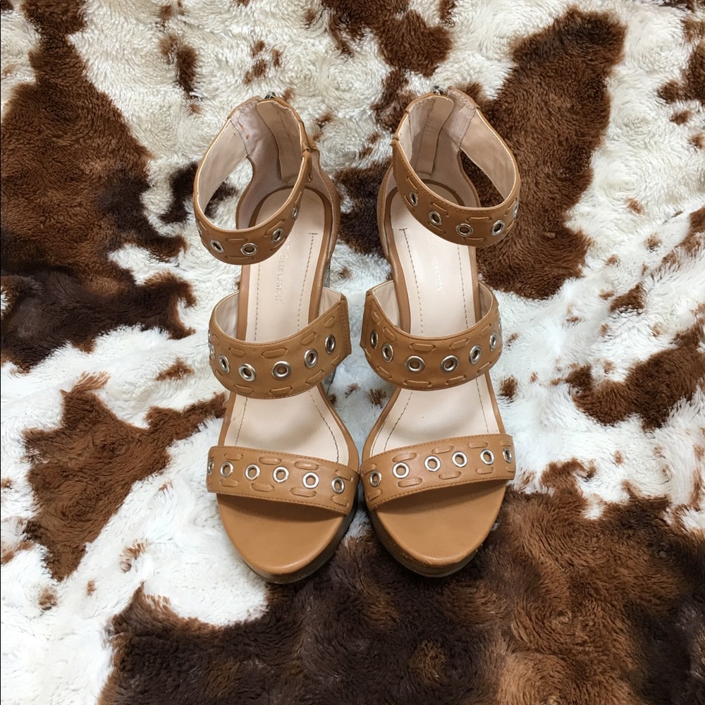 BCBG snakeskin patterned platformed wedges.