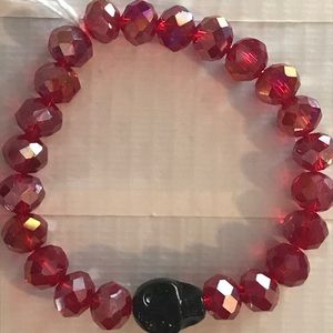 Red with black skull bracelet