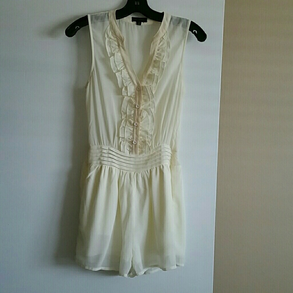Cream color romper. Perfect condition.