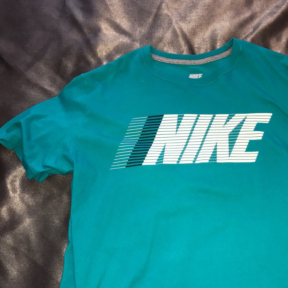 Blue Nike shirt