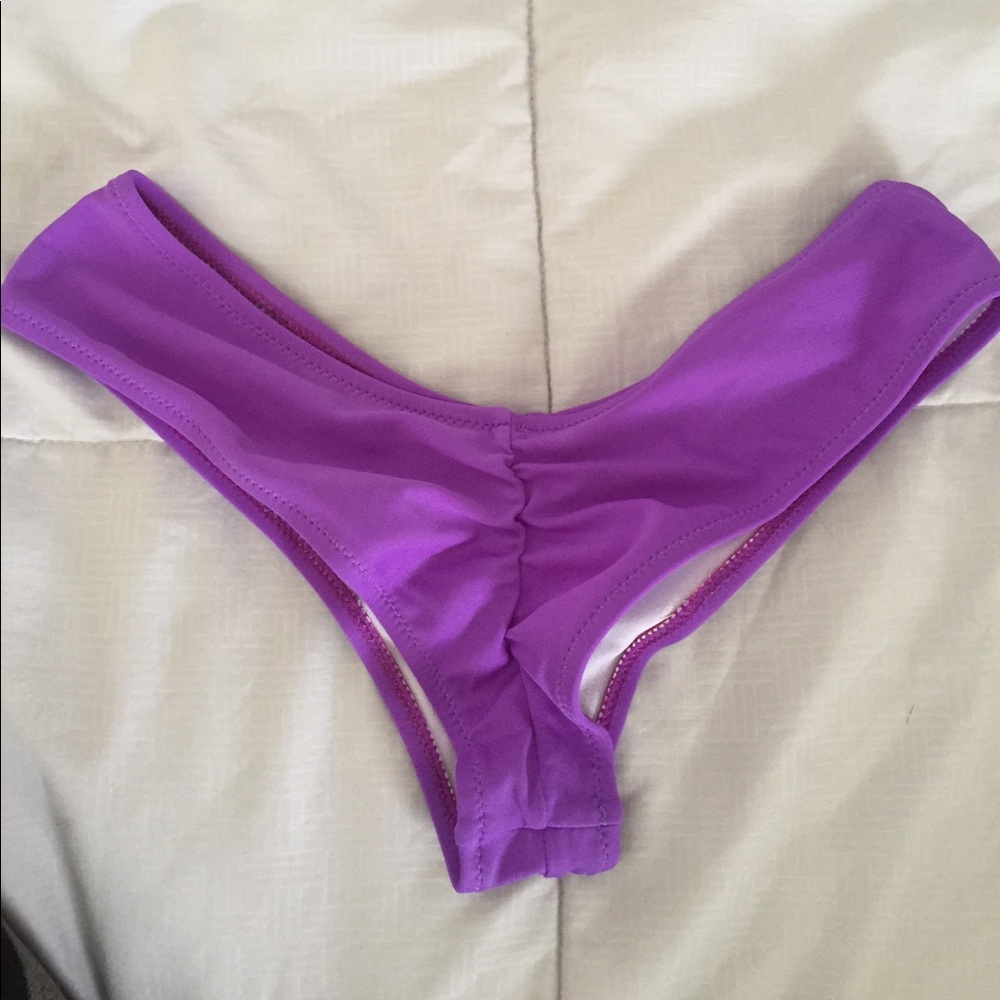 Cheeky purple bikini bottoms