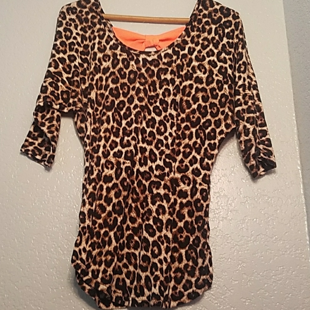 Cheetah print t with orange bow on back
