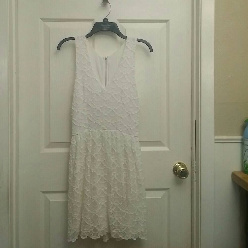 White Vneck sleeveless dress with beautiful lace