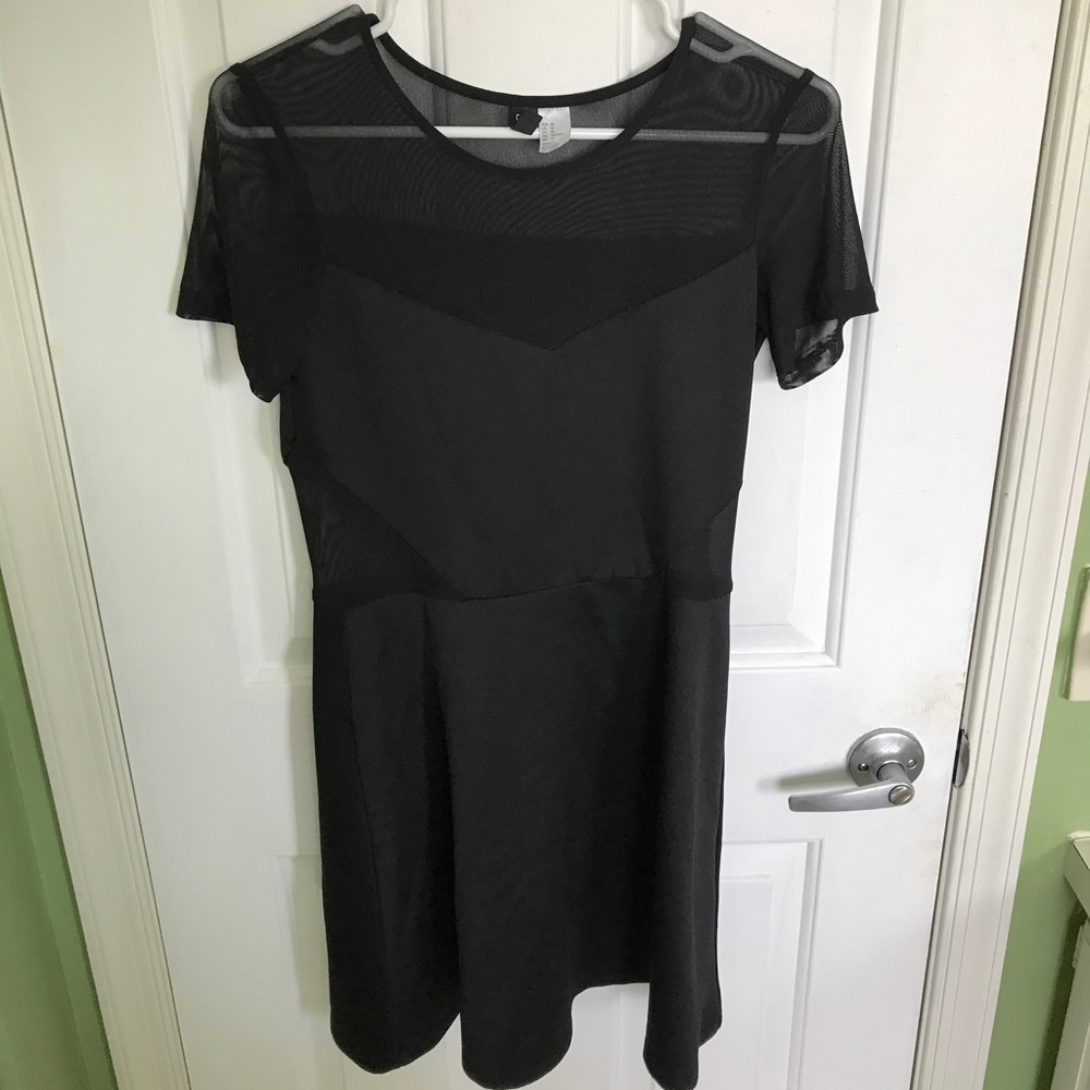 Black dress with fishnet material