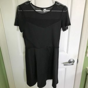 Black dress with fishnet material