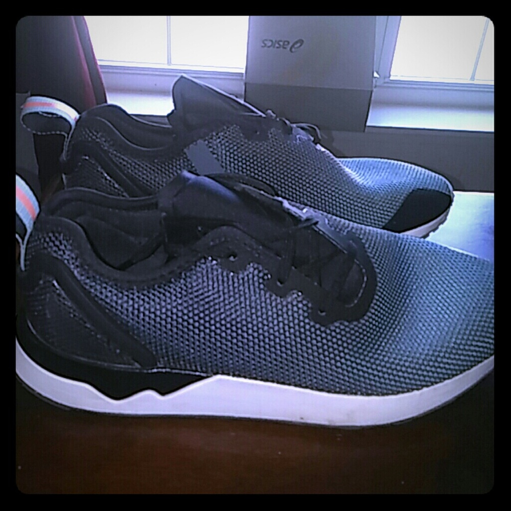 Adidias blue, white, and black sneakers.