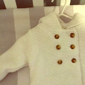 White faux fur lined coat