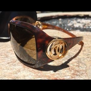 Chanel sunglasses.  Tortoiseshell with gold logos.