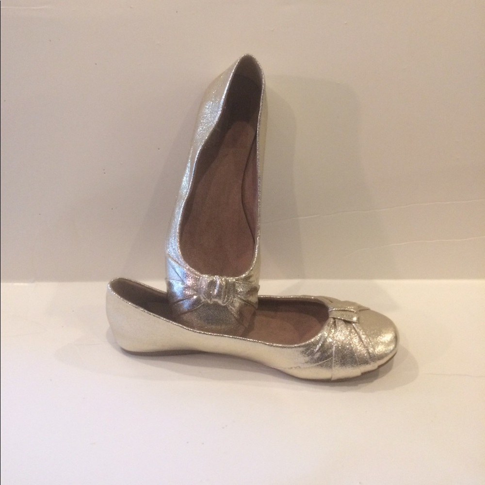 Gold ballet slippers.
