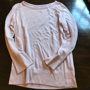 Light pink top, light weight.