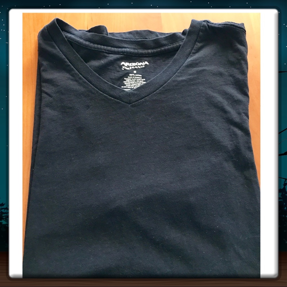 NWOT Woman’s black tee. Never worn