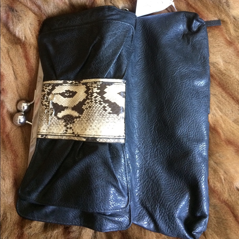 Jessica Simpson black python. - Picture 5 of 6