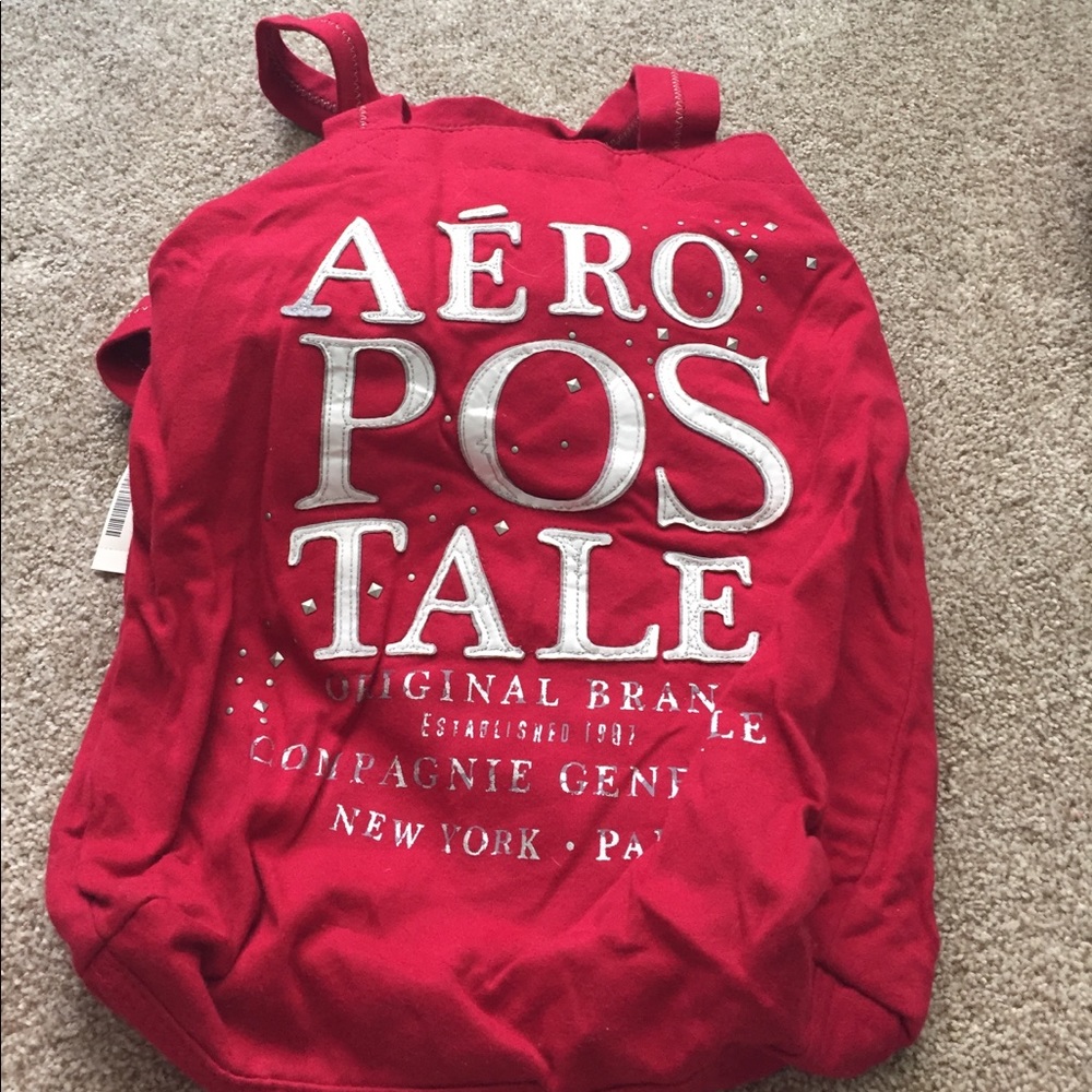 Medium red embellished tote