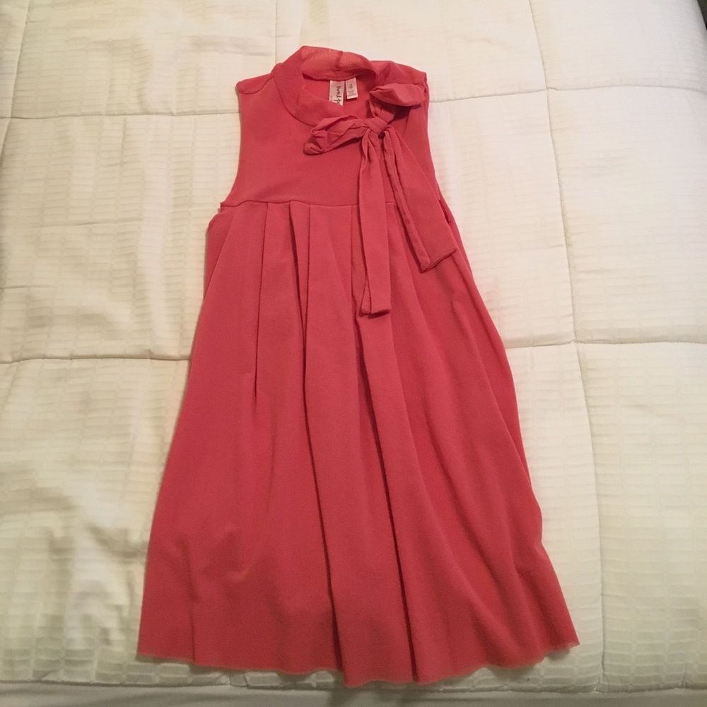 Pink sleeveless bow blouse