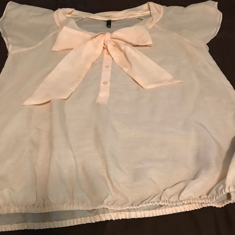Light peach blouse w/ now