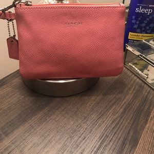 Coach pink/salmon wristlet