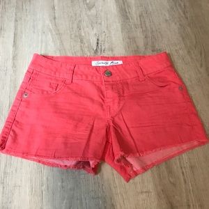 Coral shorts with fringe lining