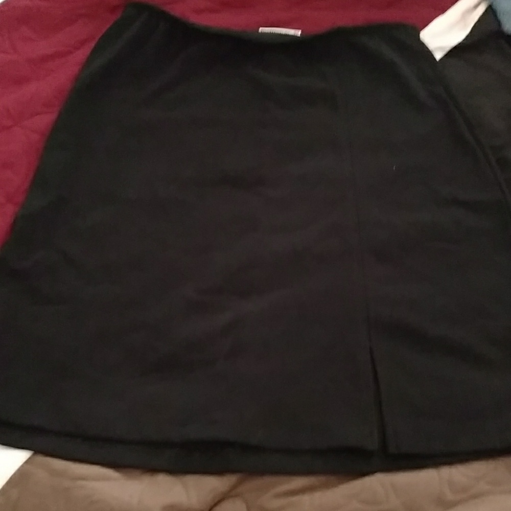 Black slimming skirt. Forms to your curves. :)
