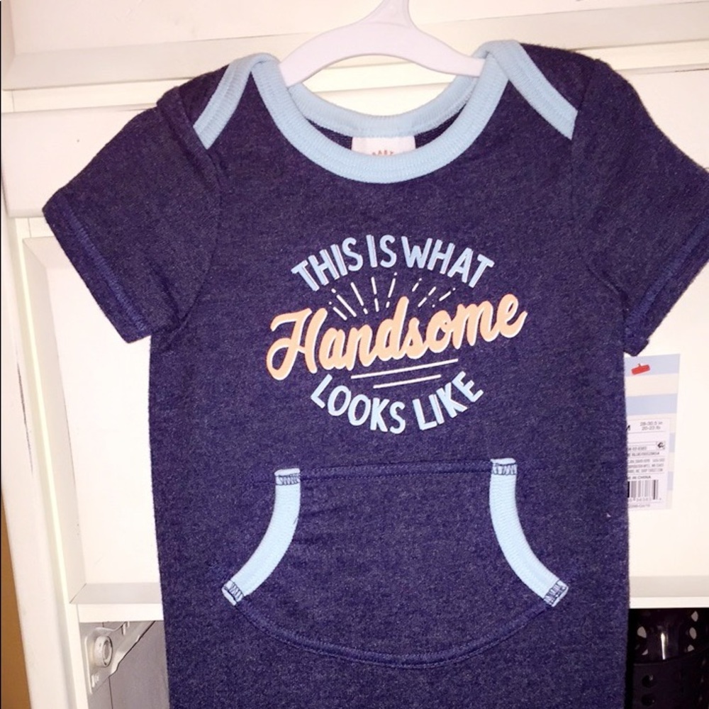 Boys size 12mos romper. NWT. Snap bottom.