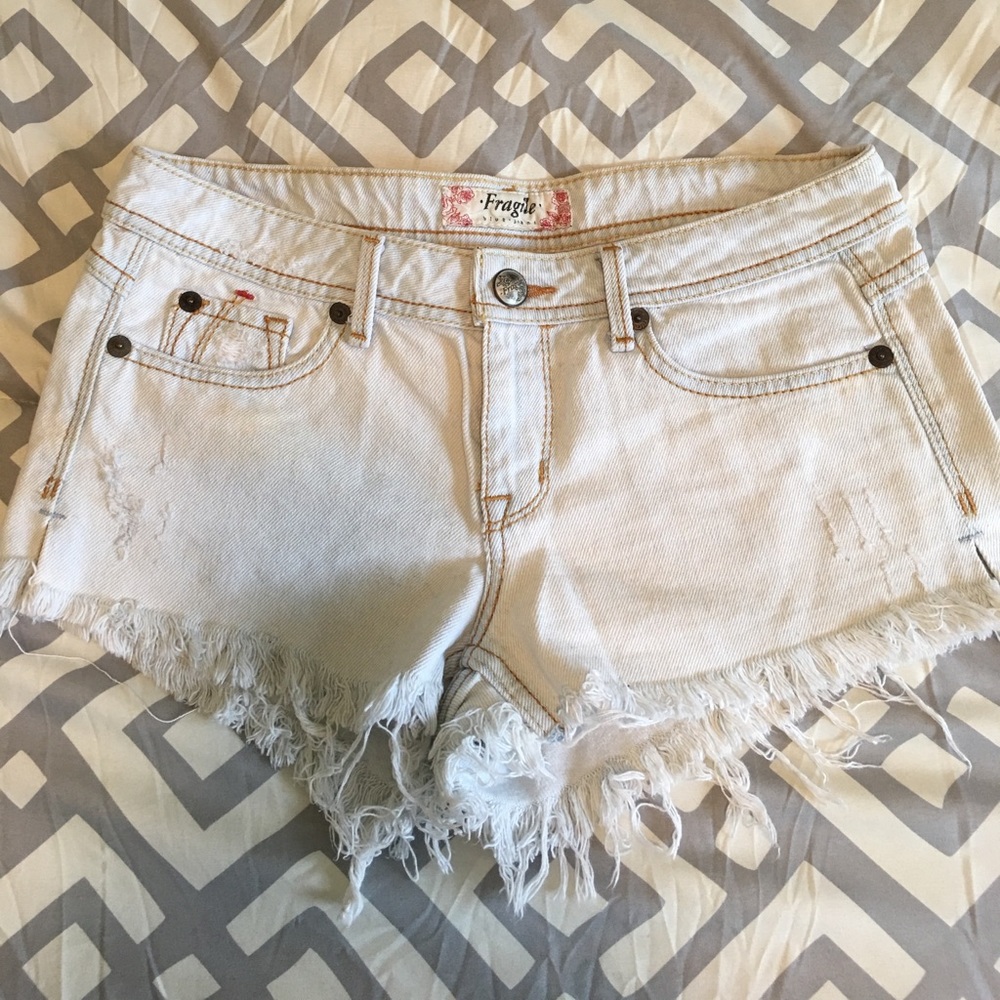 Fragile size 9 light jean shorts