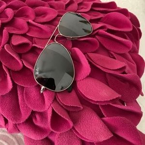 Ray-Ban aviator sunglasses.