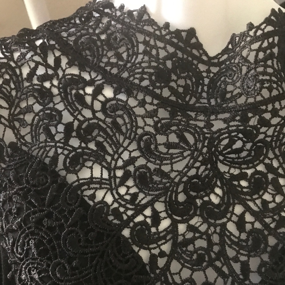Lacey blouse with ribbon