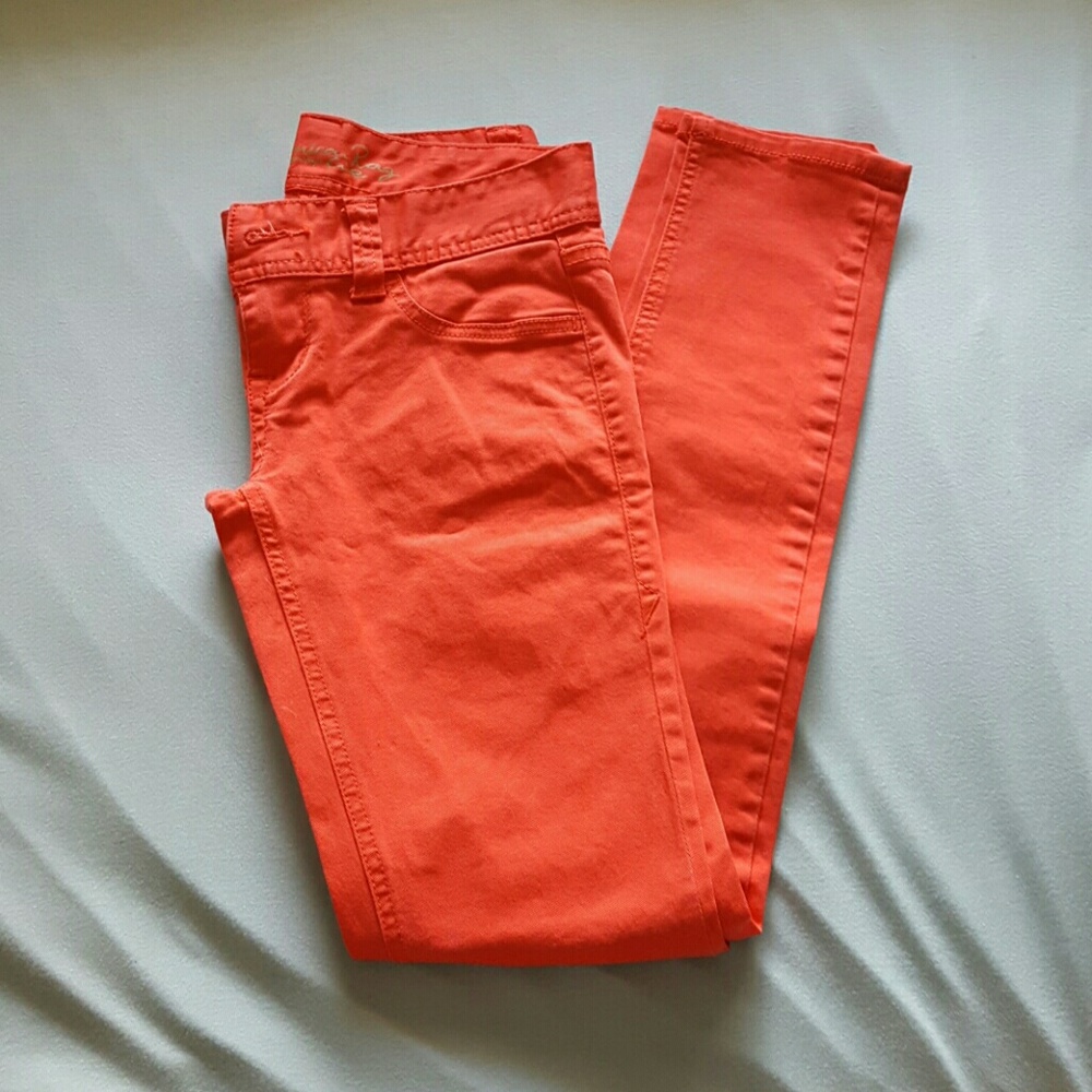 Peach colored skinny jeans