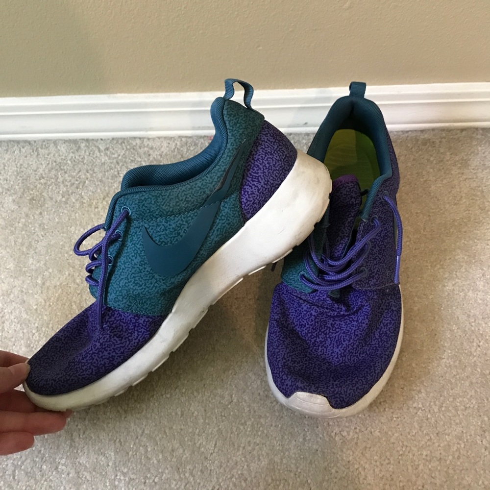 Purple Nike Roshe Runs.
