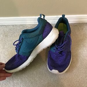 Purple Nike Roshe Runs.