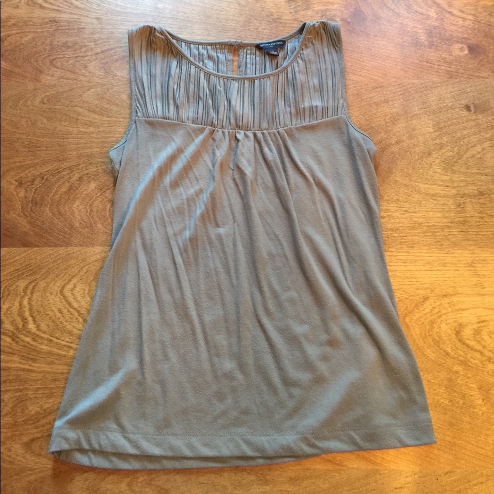 Fancy sleeveless top.