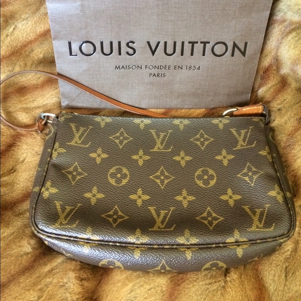 Authentic Louis Vuitton.