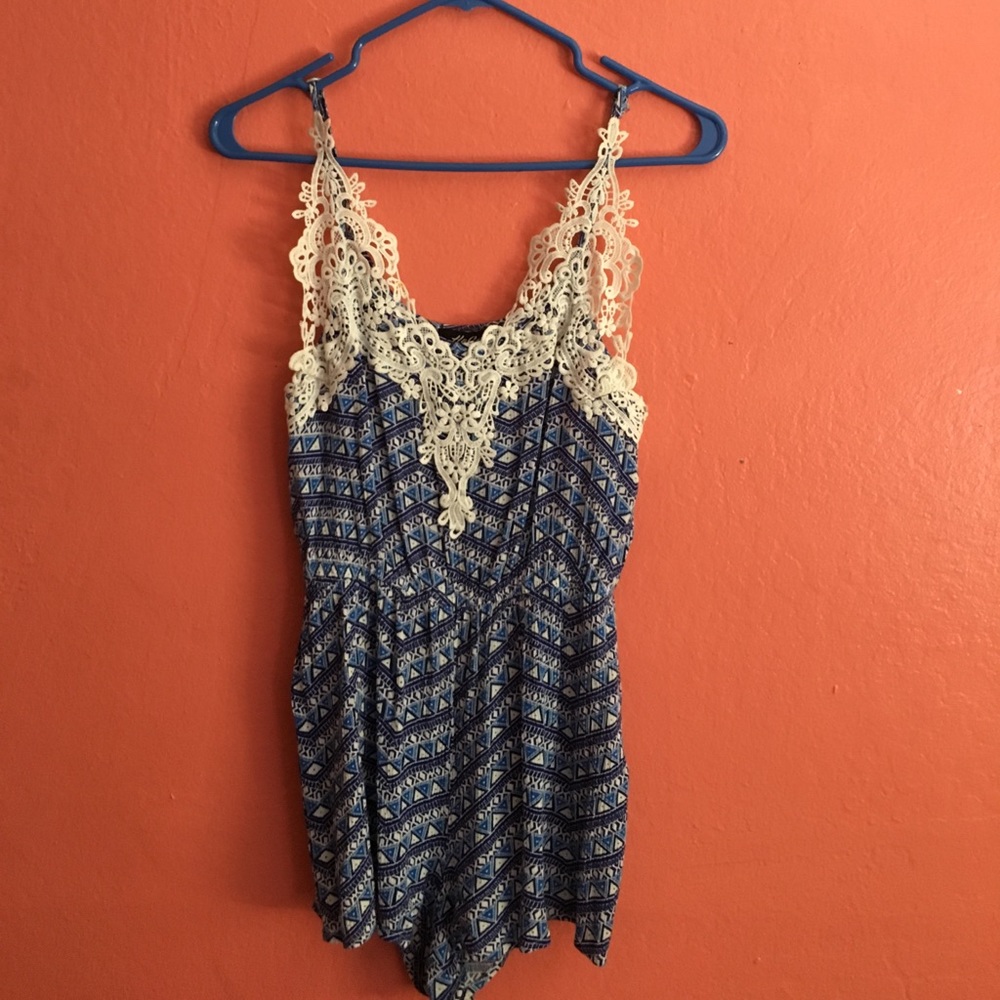 Blue romper with white coral designs