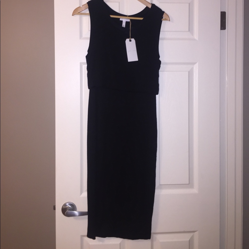 *NEW WITH TAGS. Black fitted dress