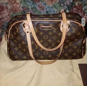 Louis Vuttion purse RESERVED DO NOT BUY