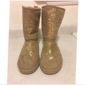 Tan Aeropostale boots with gold print