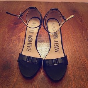 Black strapping heels