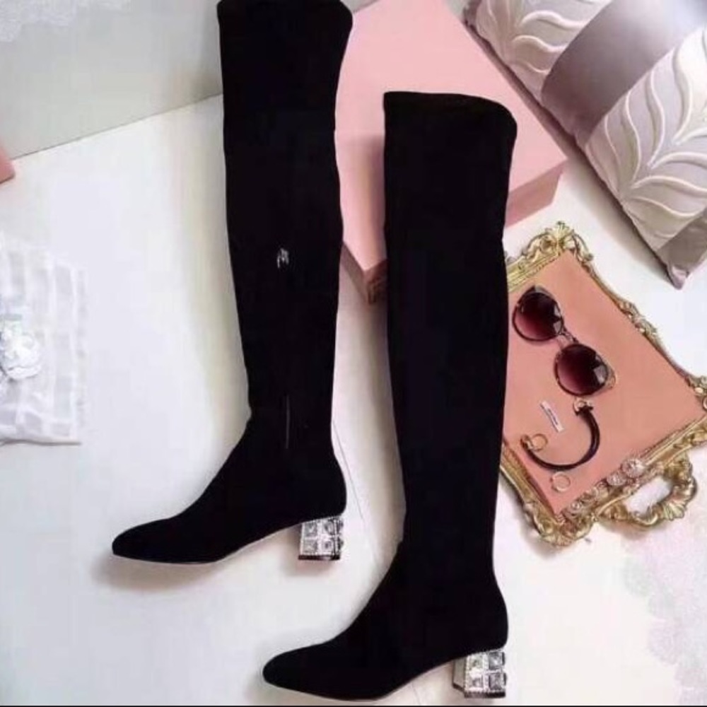 High knee boot with heel detail