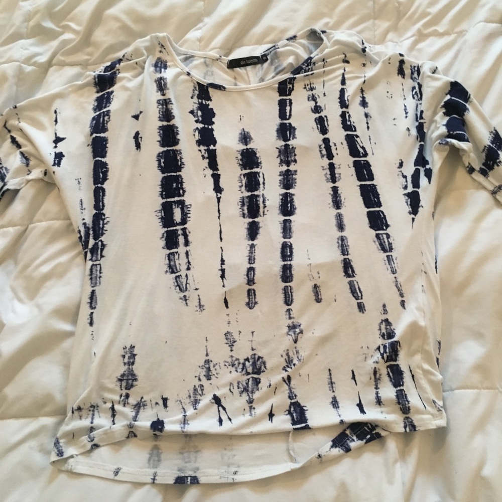 Blue tie-die shirt wth cut back